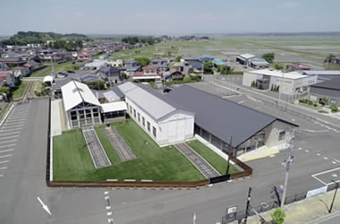 くりでんミュージアム空撮写真。写真左側線路が伸びている建物が、使用されていた車庫